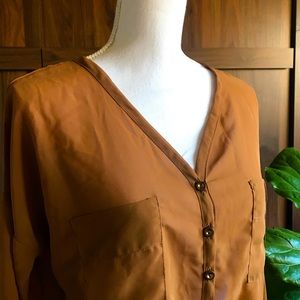 mine. Camel color button down blouse